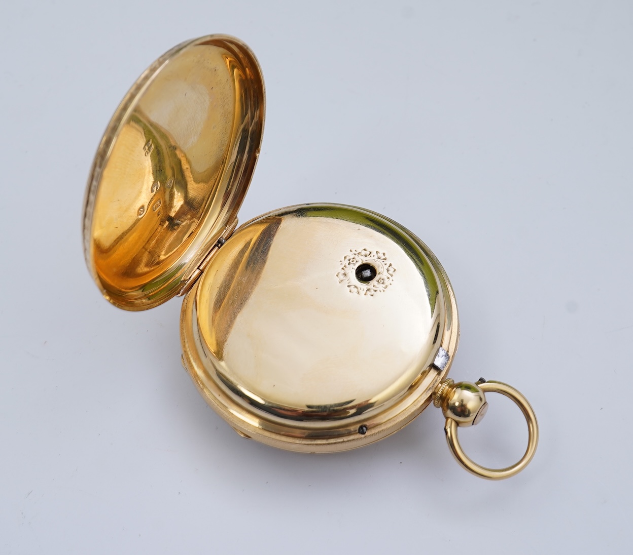 A Victorian engraved 18ct gold open faced key wind pocket watch